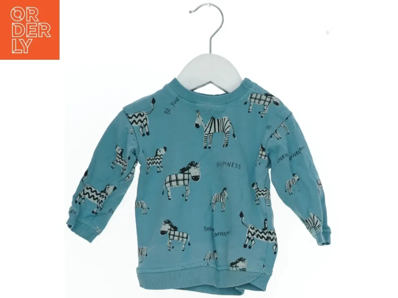 Billede 1 - Langærmet bluse med zebra design fra H&M (str. 74)